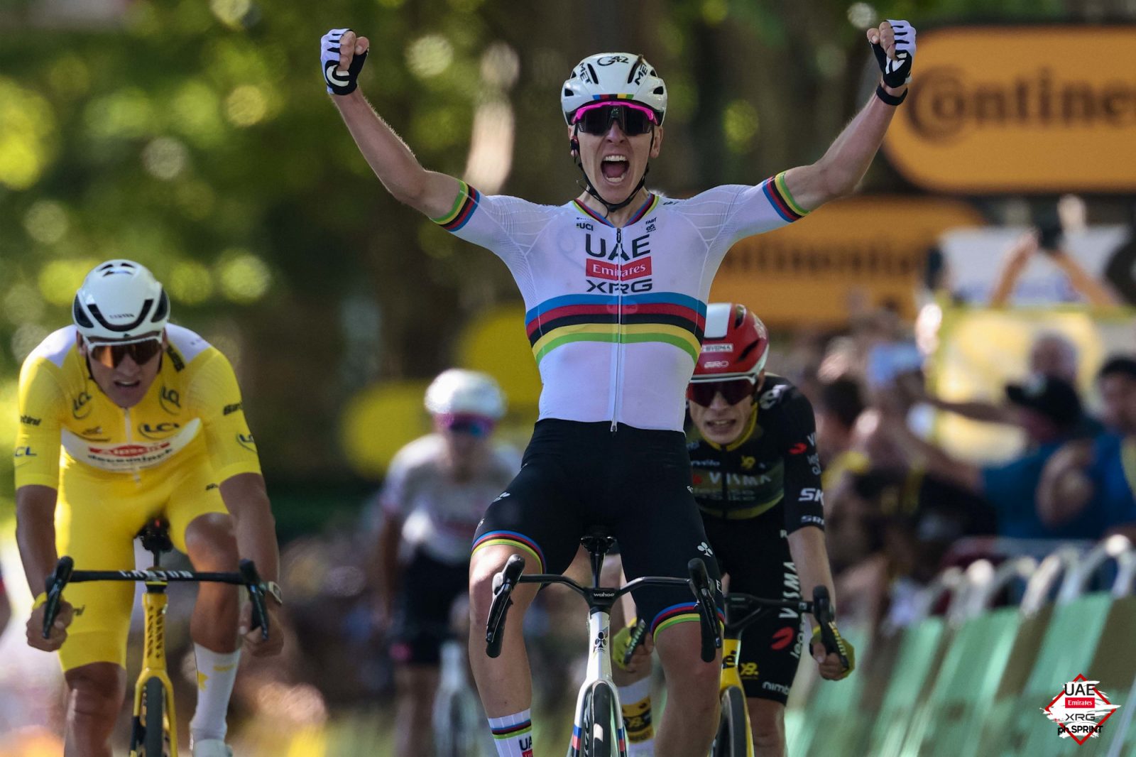 Tadej Pogačar roars across the line on stage 4
