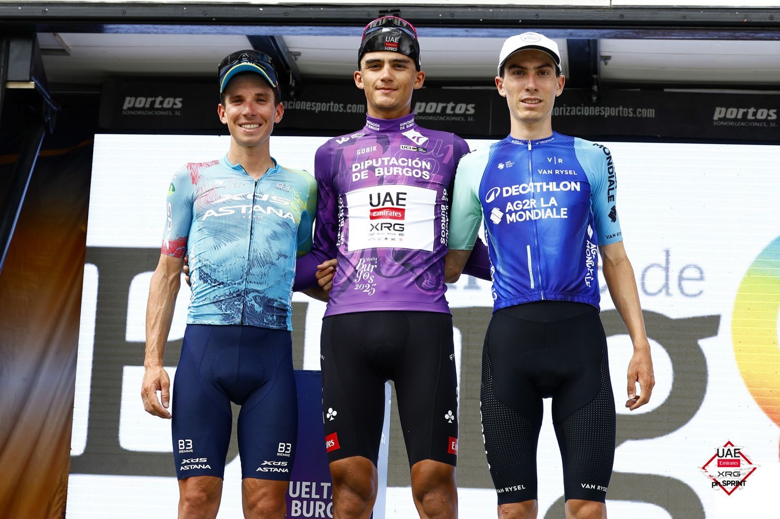 Isaac del Toro stands on the top step of the podium in Burgos