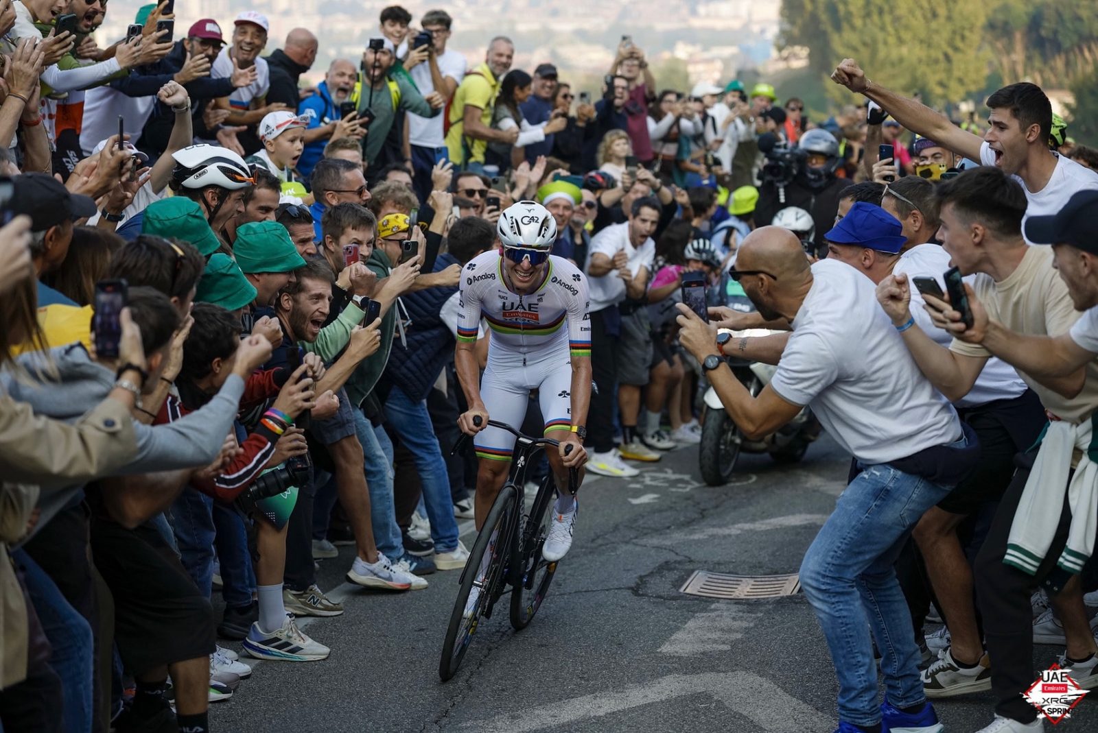 Tadej Pogačar roars up the final climb towards victory