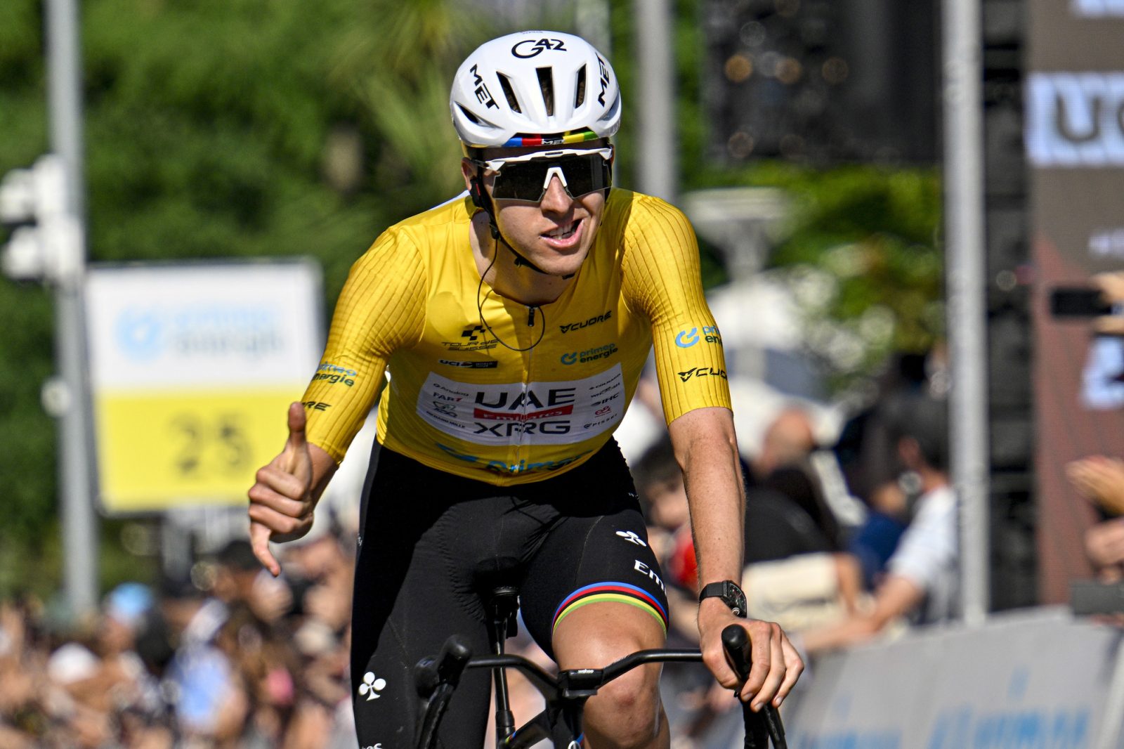 Tadej Pogačar crosses the finish line on stage 2