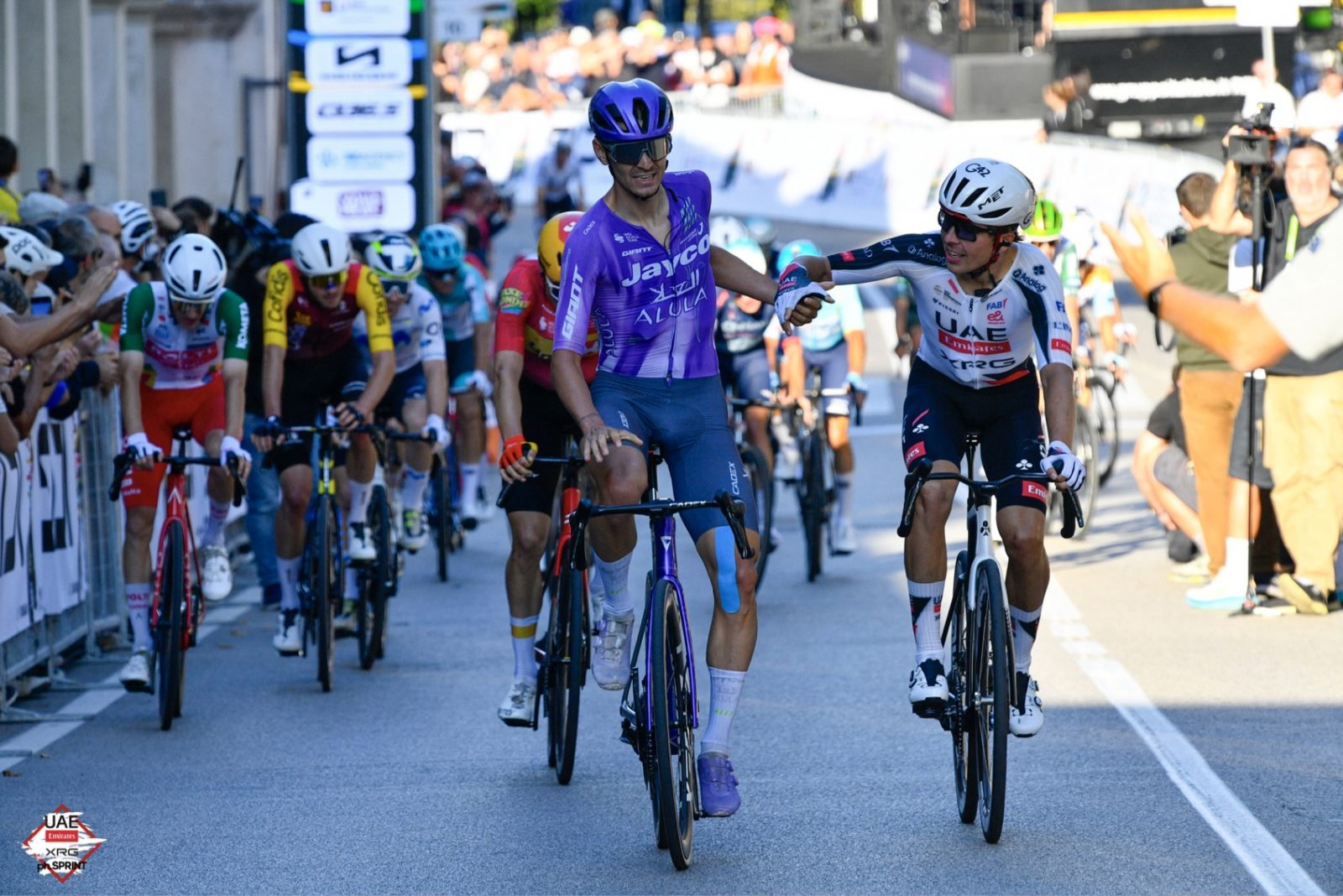 Benoît Cosnefroy congratulates Alessandro Covi on his win